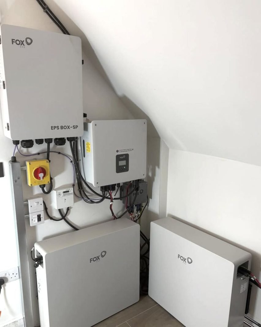 Home battery storage and inverter on a wall